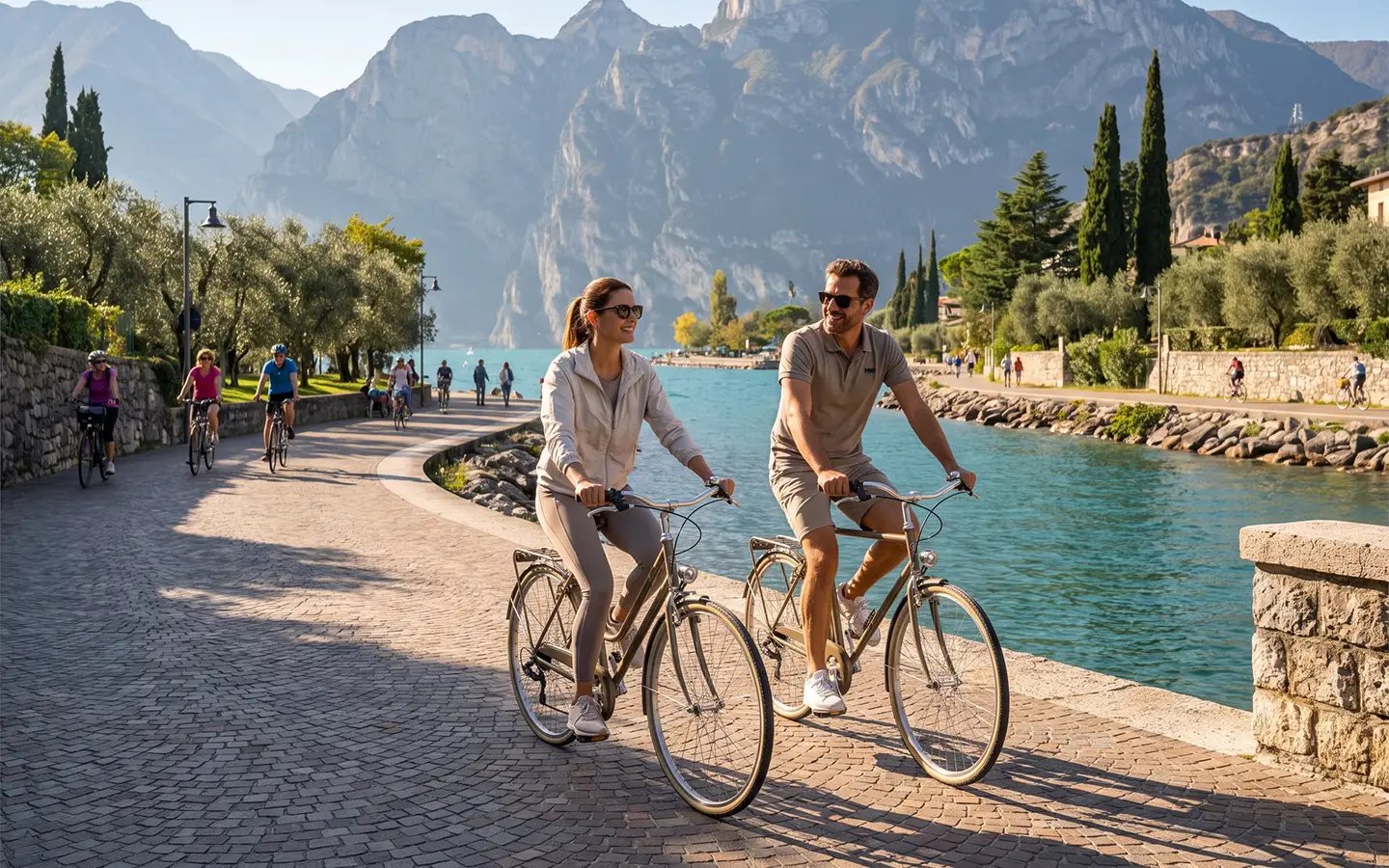 Cyclists among vineyards and olive groves in the Valtenesi near Moniga del Garda